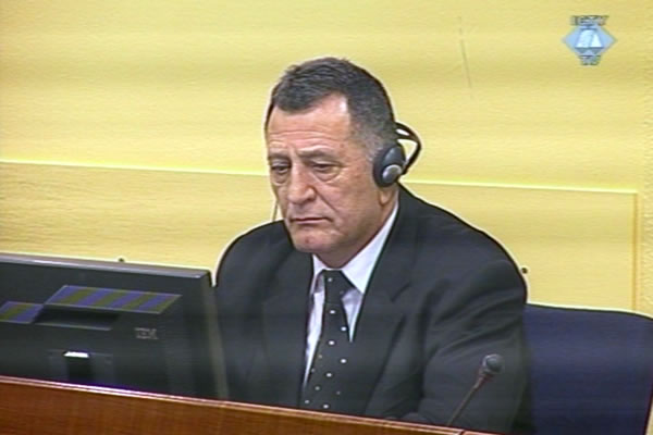 Milan Tupajic in the courtroom Milan Tupajic in the courtroom