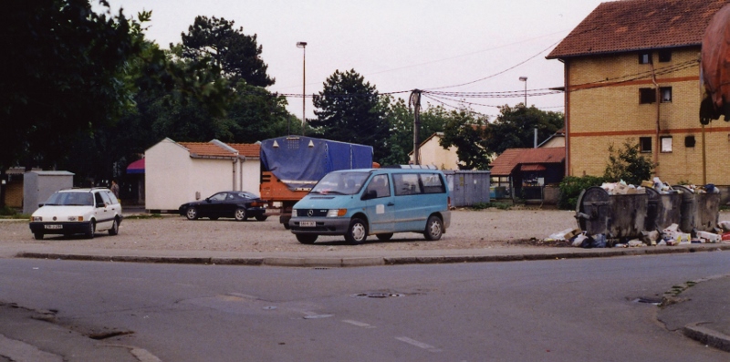 x6. Car parks, communal garbage containers and kiosks: typical uses for the levelled site of a destroyed mosque. The site of the Krpića Mosque in Bijeljina, June 2001. © Richard Carlton 