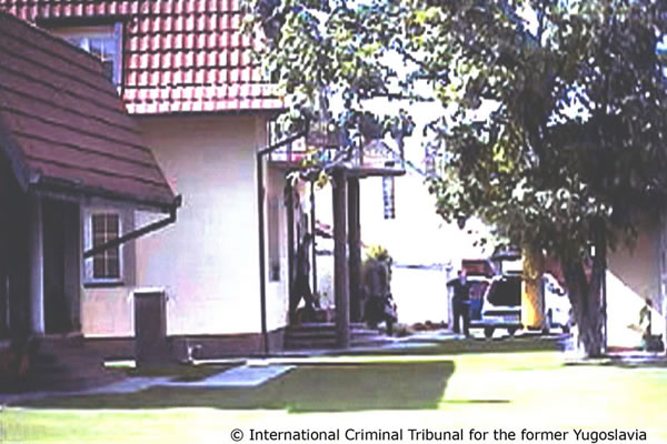 Goran Hadzic approaching a car in front of the house in Novi Sad Goran Hadzic approaching a car in front of the house in Novi Sad