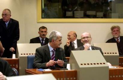 Jadranko Prlic and Bruno Stojic in the front row and Slobodan Praljak, Milivoj Petkovic, Valentin Coric and Berislav Pusic in the back row